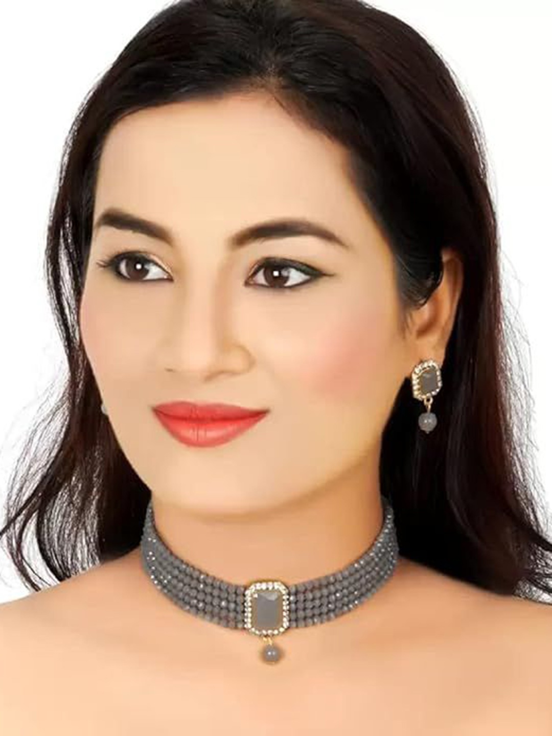 

Kezlin Gold-Plated Stone Studded & Beaded Kottage Choker Jewellery Set
