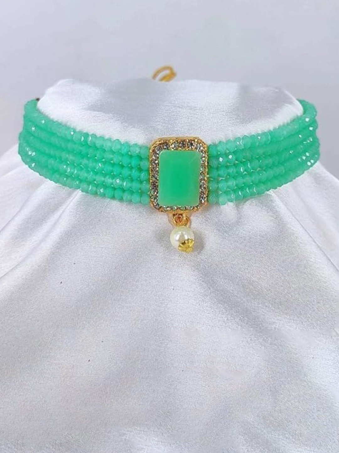 

Kezlin Gold-Plated Stone Studded & Beaded Kottage Choker Jewellery Set