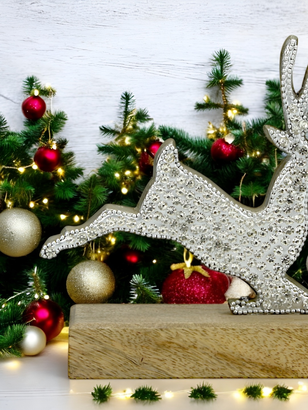 

Hind Decor Silver Toned Textured Metal Reindeer on Wooden Base Showpiece