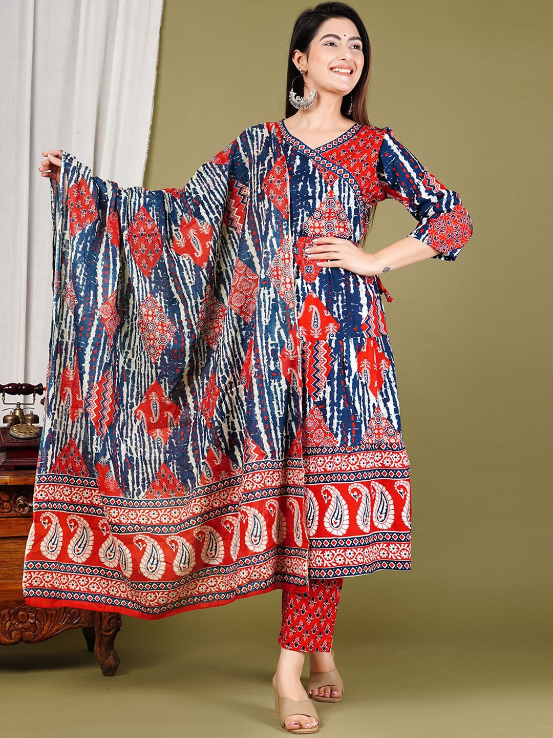 

Meena Bazaar Ethnic Motifs Printed Angrakha V-Neck Kurta With Trousers & Dupatta, Red