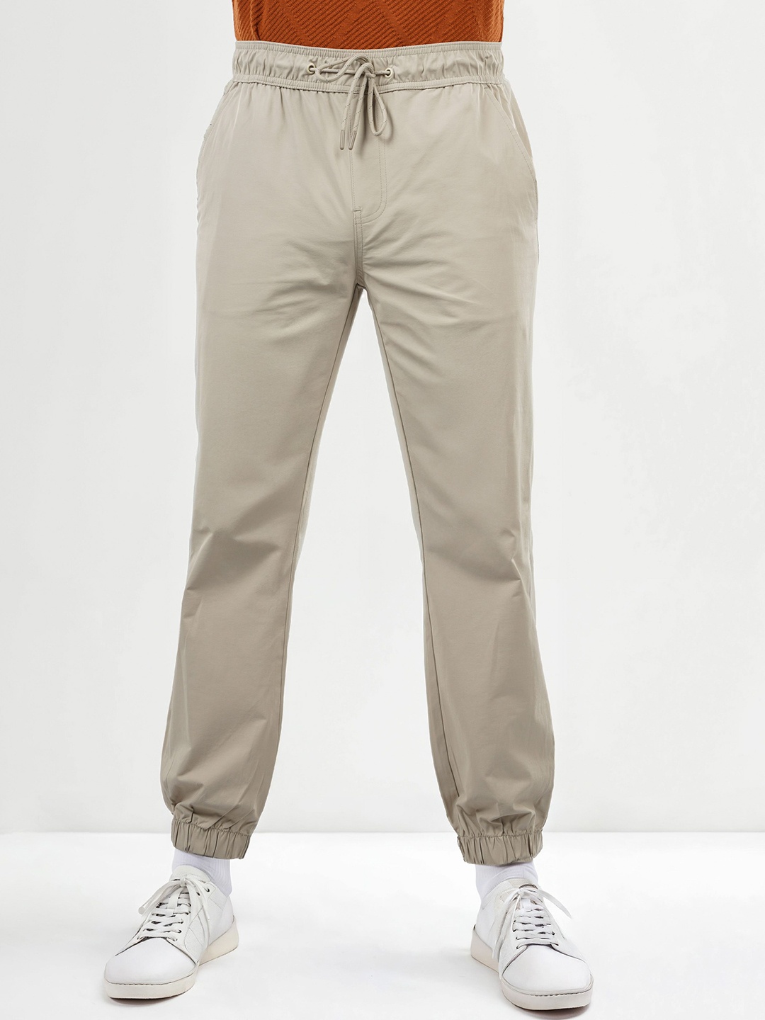 

Celio Men Solid Regular Fit Joggers Trousers, Beige