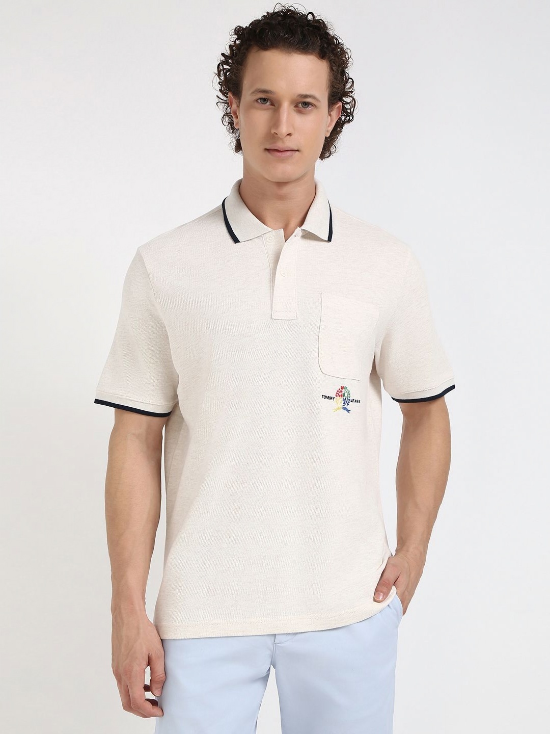

Tommy Hilfiger Men Solid Polo Collar Cotton T-shirt, White