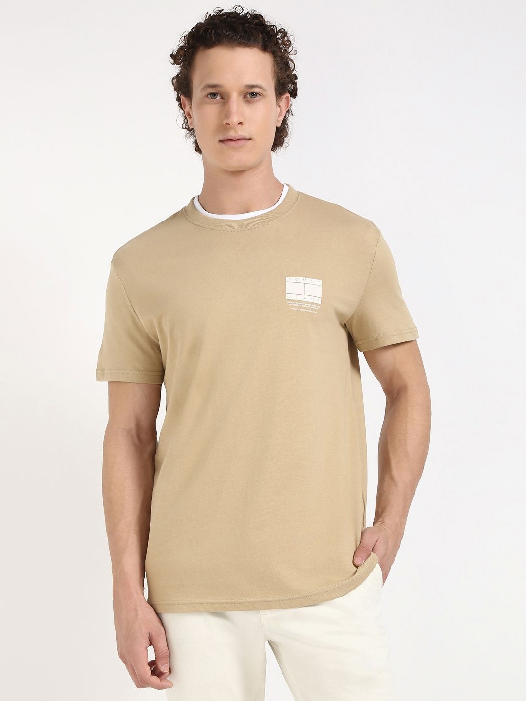 

Tommy Hilfiger Men Solid Round Neck Cotton T-shirt, Brown