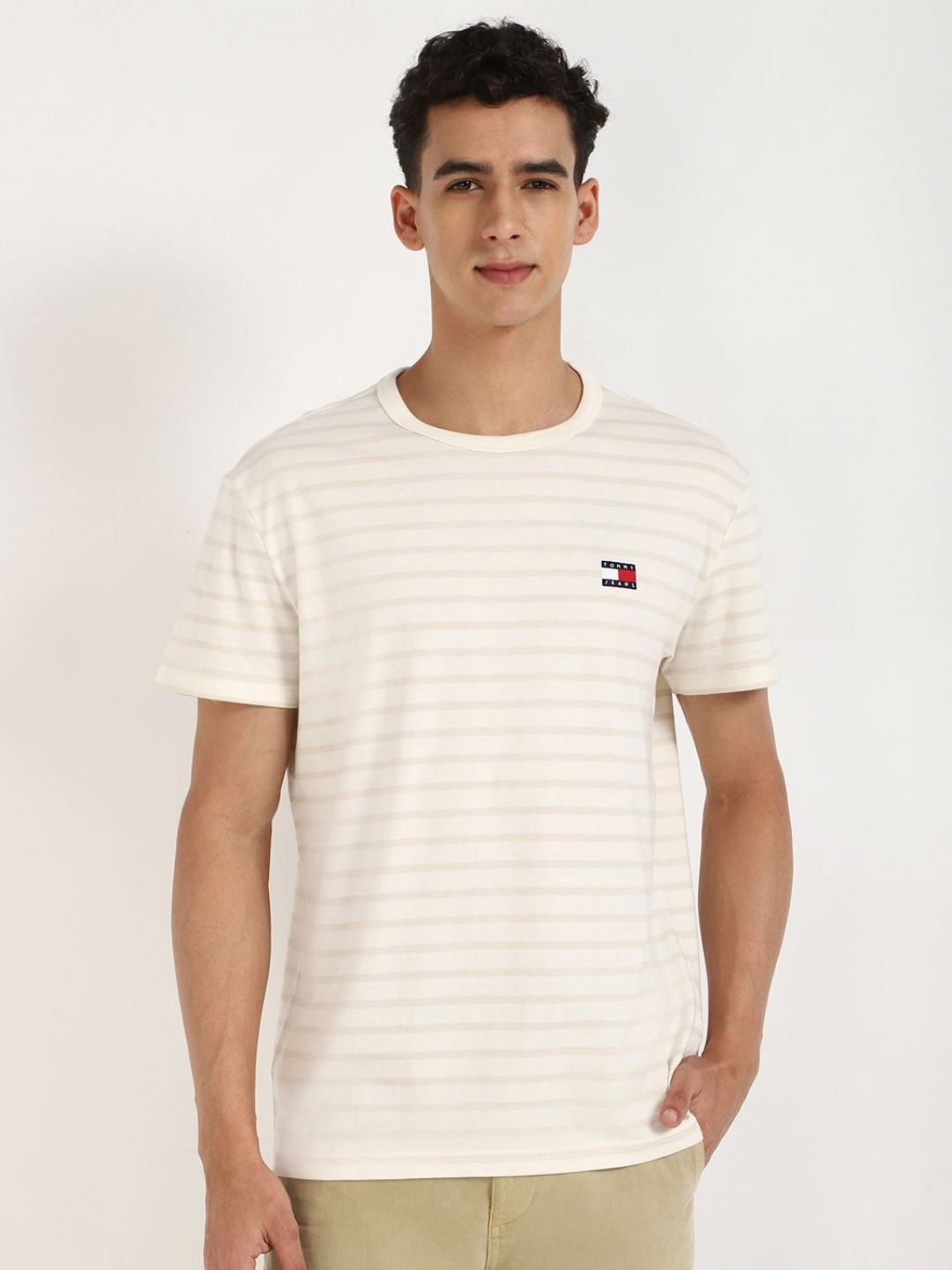 

Tommy Hilfiger Men Striped Round Neck Cotton T-shirt, Off white