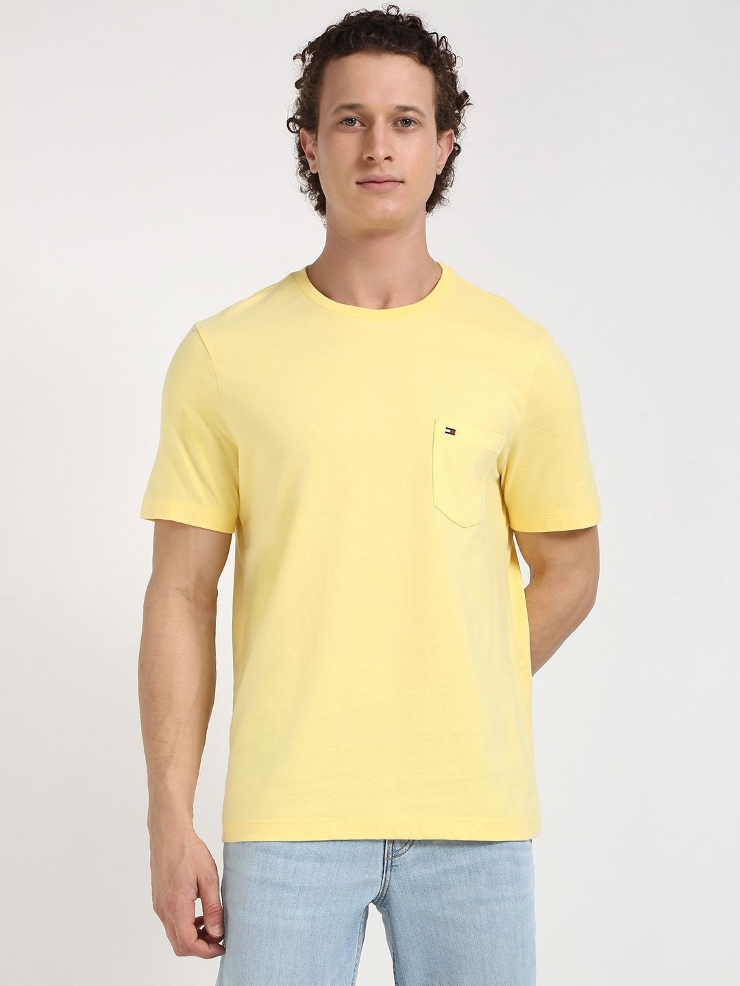 

Tommy Hilfiger Men Solid Round Neck Cotton T-shirt, Yellow