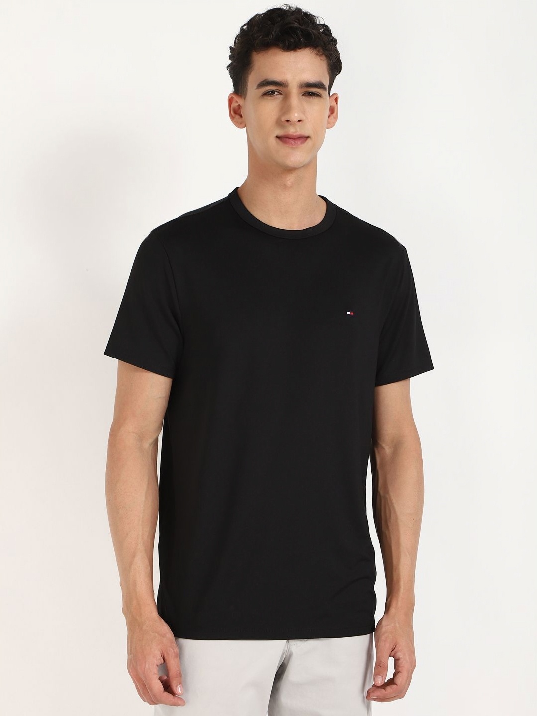 

Tommy Hilfiger Men Solid Round Neck T-shirt, Black