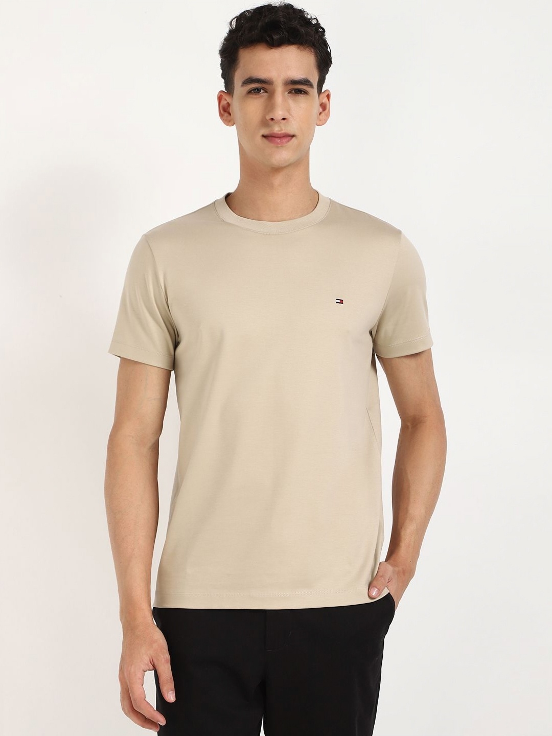 

Tommy Hilfiger Men Solid Round Neck Cotton T-shirt, Beige