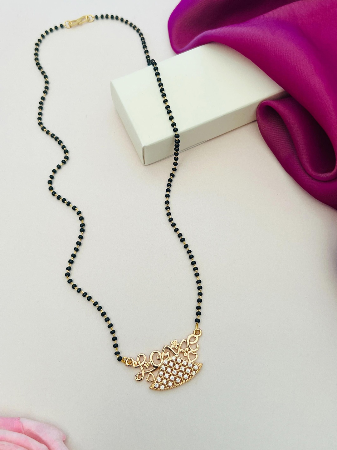 

Anouk Gold-Plated Stone Studded & Beaded Mangalsutra