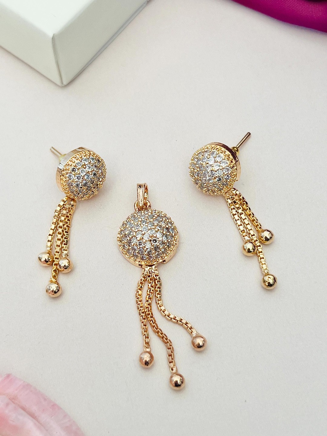 

Anouk Gold-Plated American Diamond Stone-Studded Pendant and Earrings