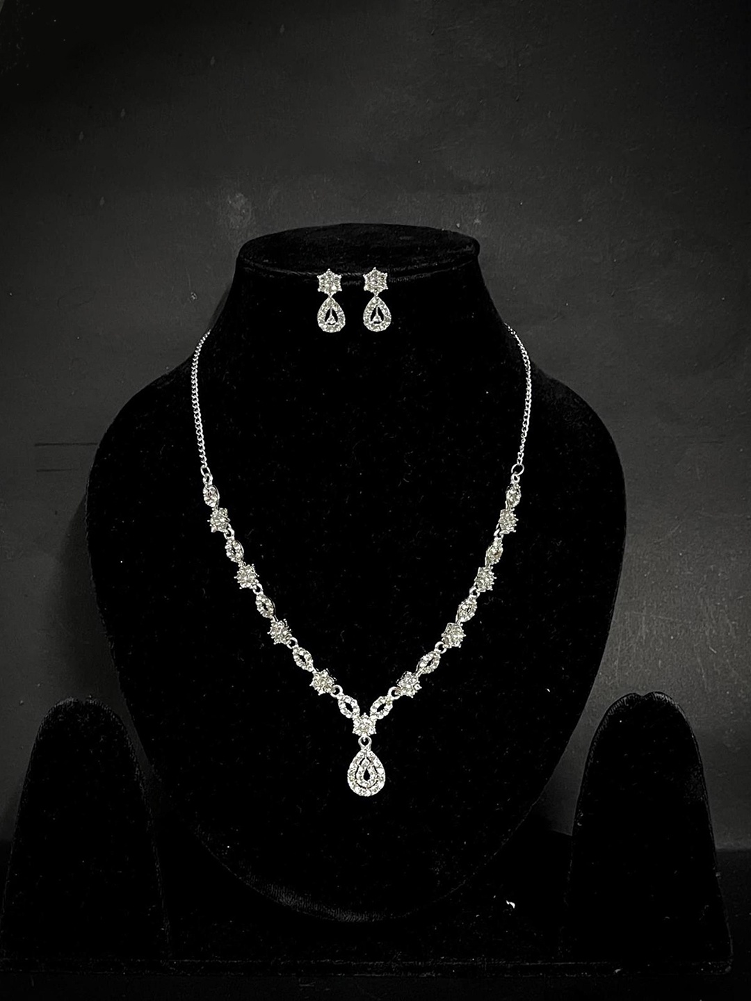 

TANLOOMS Silver-Plated Artificial Stone-Studded Necklace & Earrings