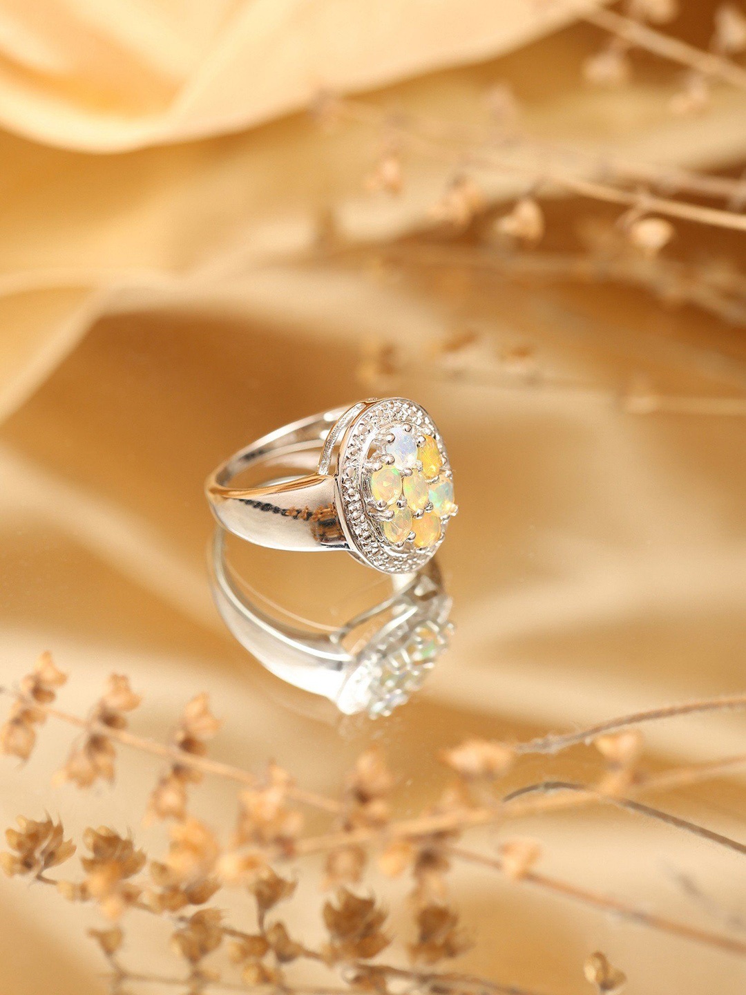 

Exotic India Sterling Silver Ring with Oval Cut Ethiopian Opal