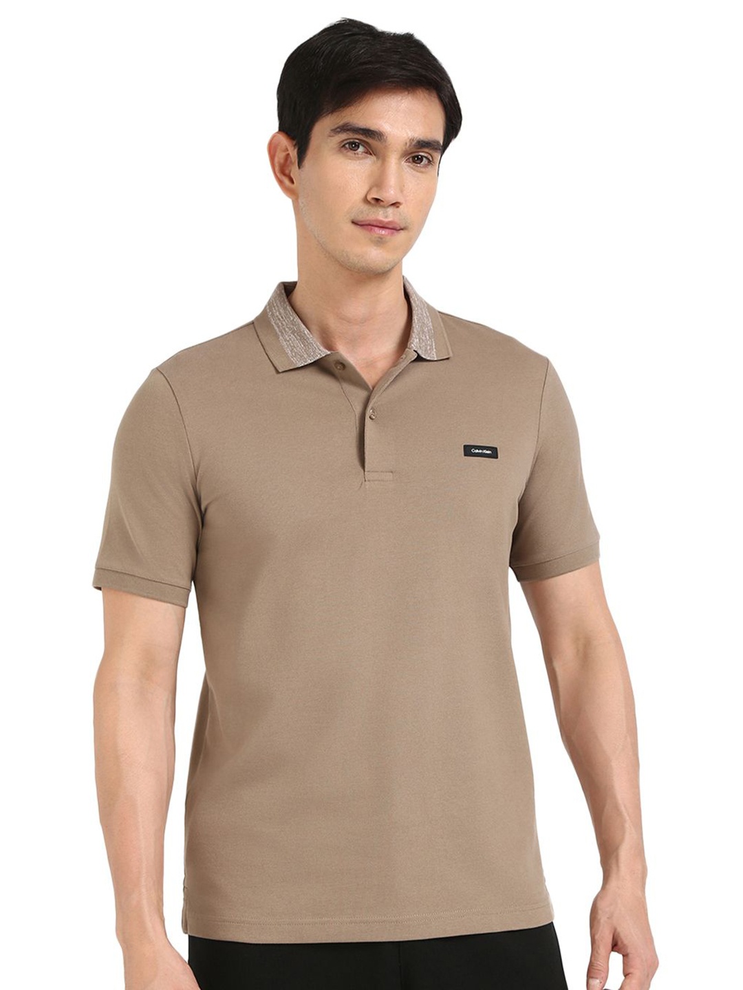 

Calvin Klein Jeans Men Solid Round Neck Cotton Slim Fit T-shirt, Beige