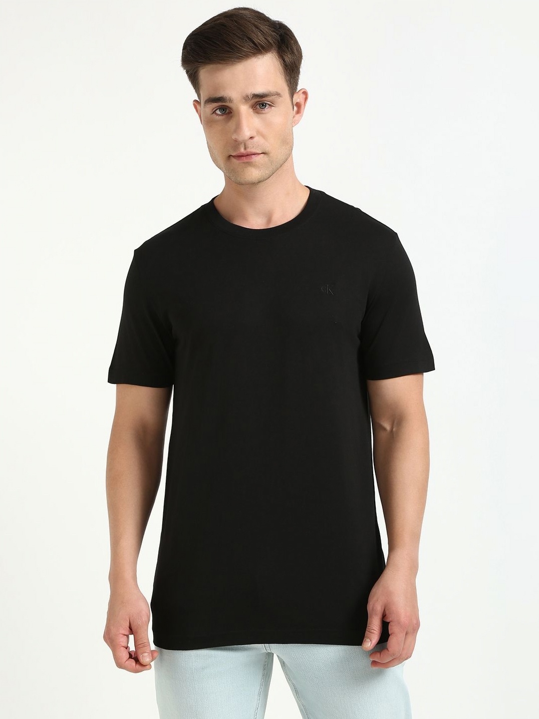 

Calvin Klein Jeans Men Solid Round Neck Cotton Slim Fit T-shirt, Black