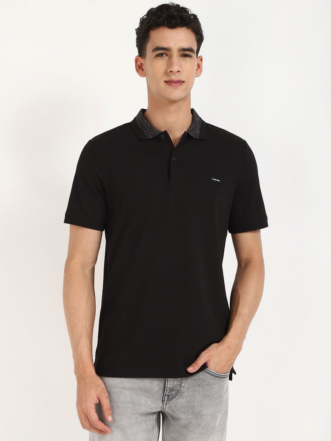 

Calvin Klein Jeans Men Solid Round Neck Cotton Slim Fit T-shirt, Black