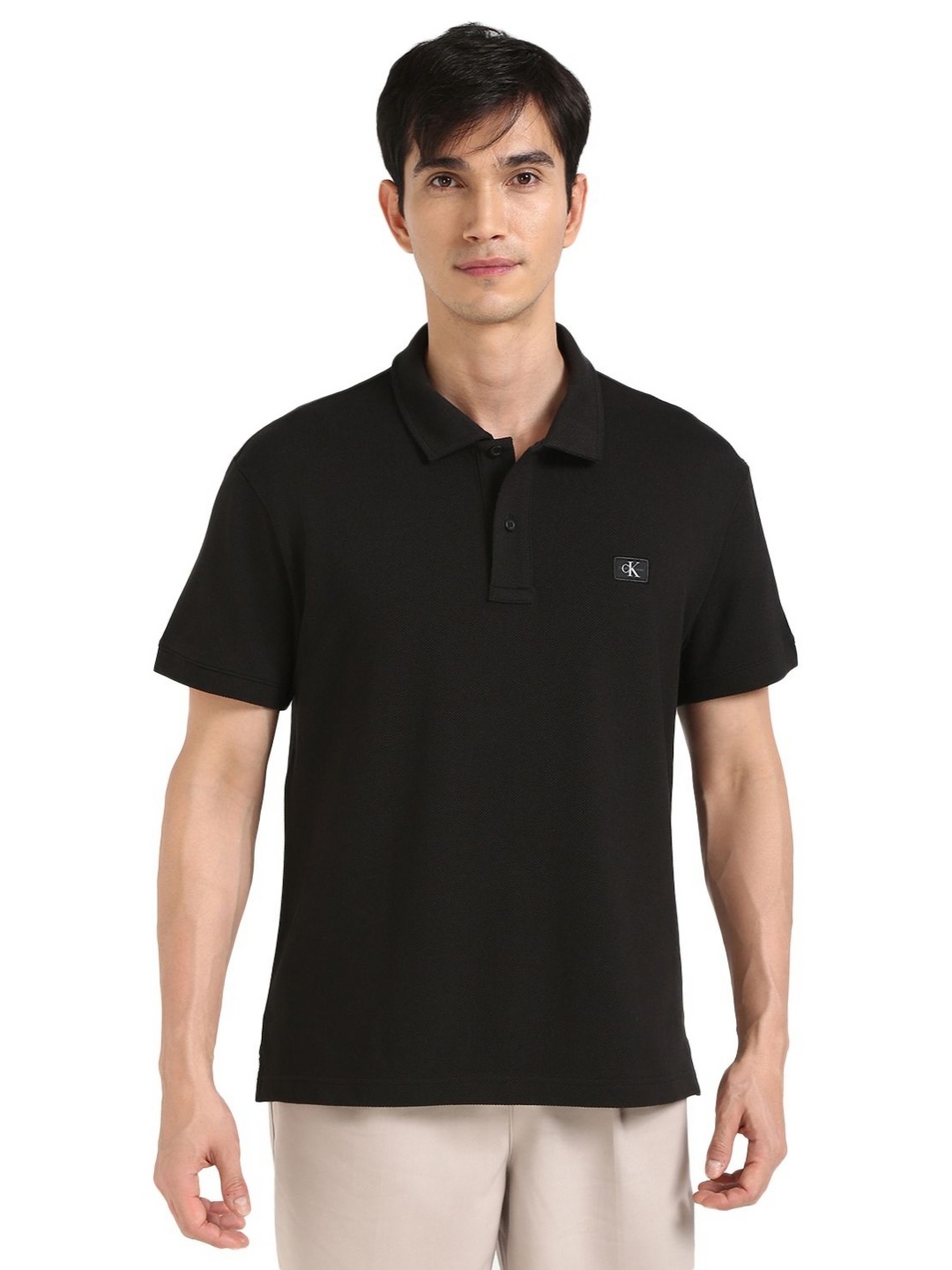 

Calvin Klein Jeans Men Solid Round Neck Cotton T-shirt, Black