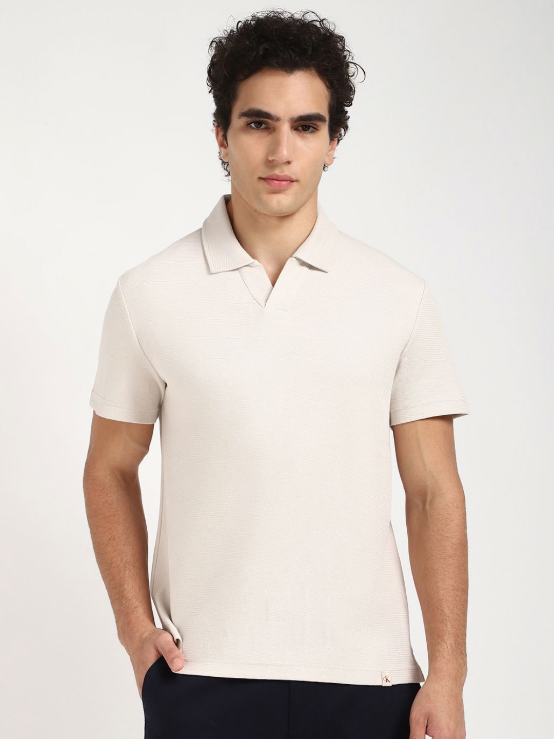 

Calvin Klein Jeans Men Solid Round Neck Cotton T-shirt, Beige