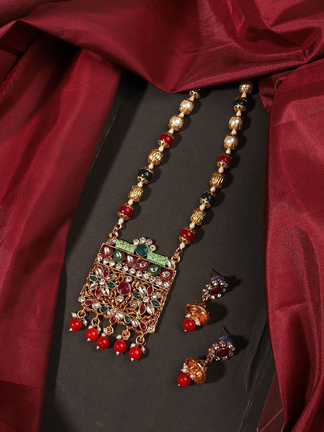 

ANIKAS CREATION Gold Plated Crystal Stone Studded & Beaded Meenakari Necklace and Earrings