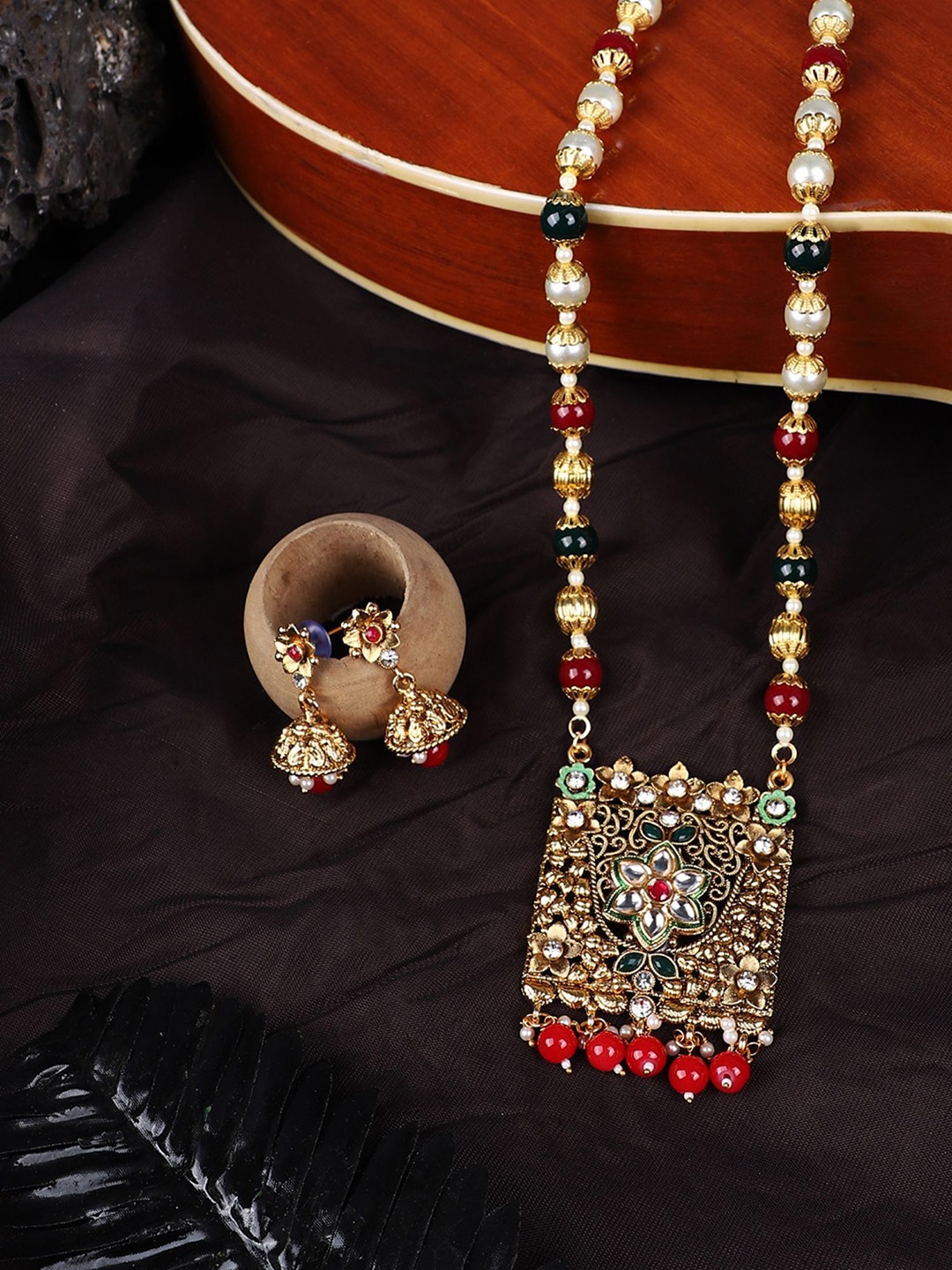 

ANIKAS CREATION Gold-Plated Stone-Studded & Beaded Meenakari Necklace and Earrings