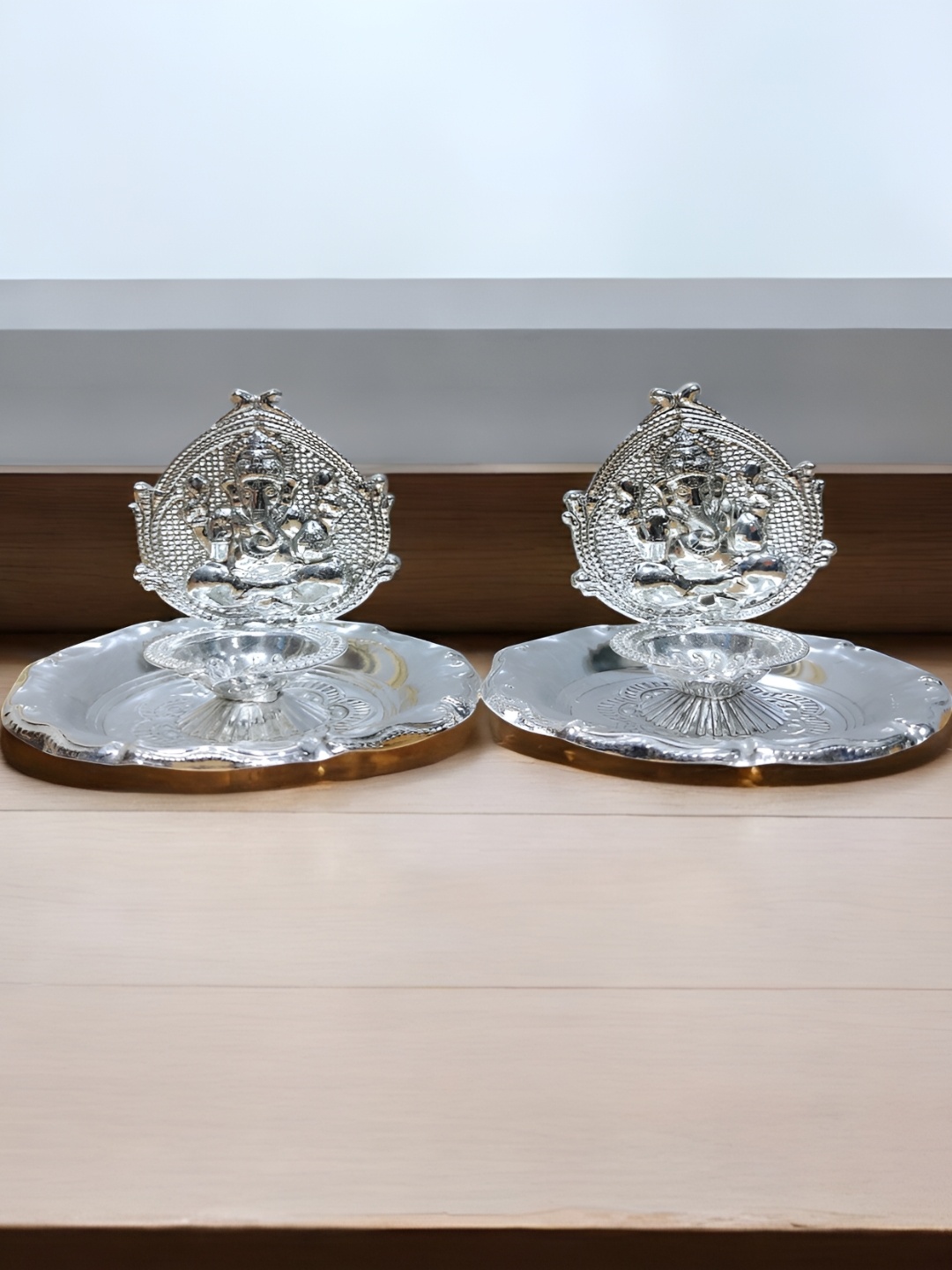 

Sigaram Silver-Toned 2 Pieces Textured Ganesh Diya