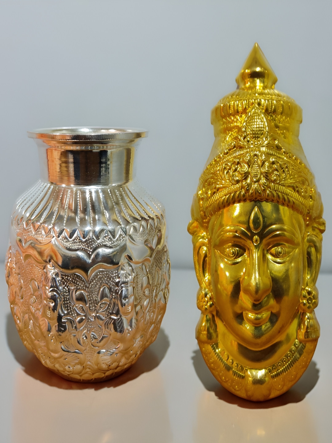 

Sigaram Pooja Articles Silver-Toned & Gold-Toned 2 Pieces Kalash & Lakshmi Face Mukoot