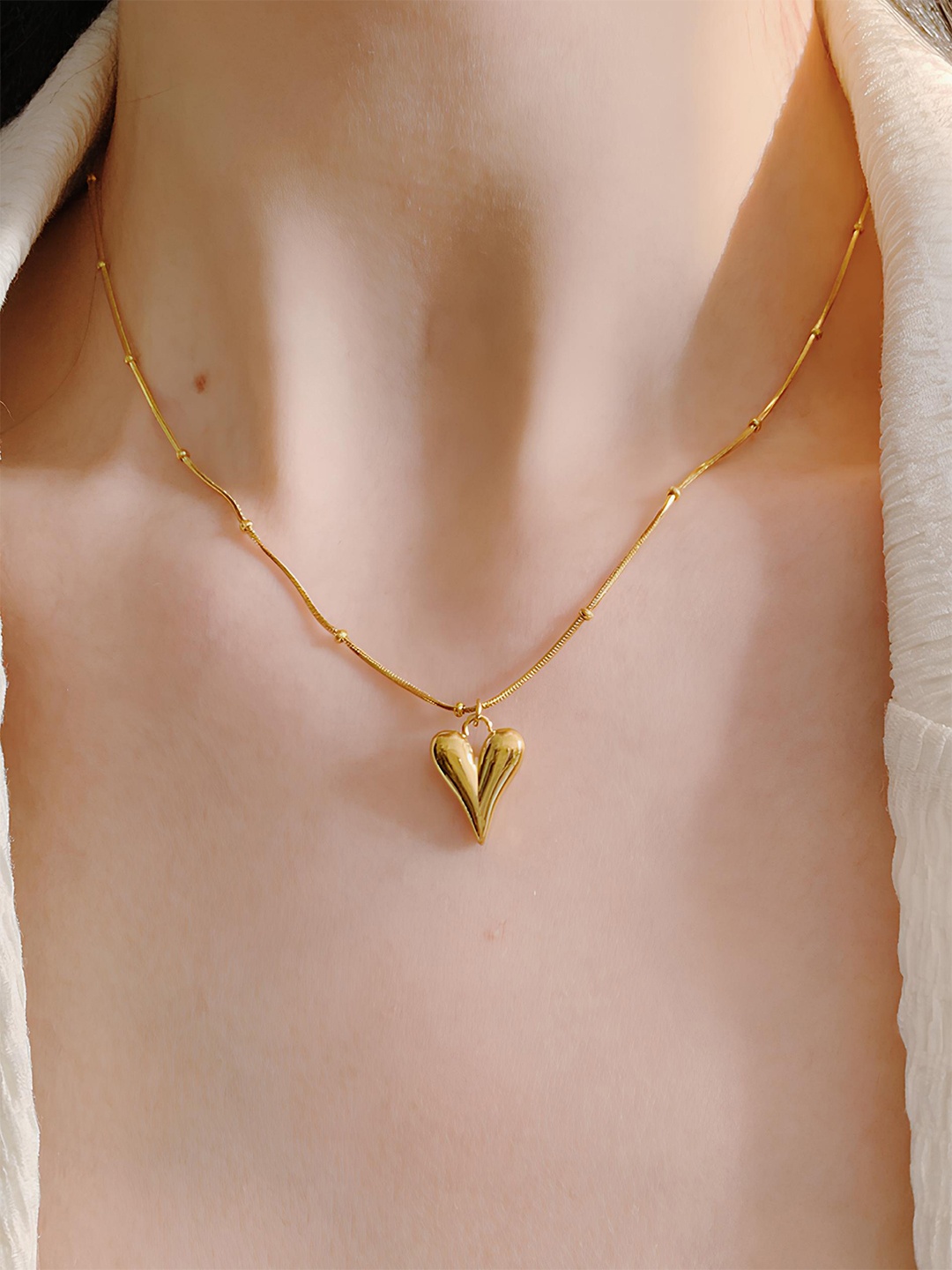 

Jewels Galaxy Gold Plated Heart Shaped Pendant With Chain