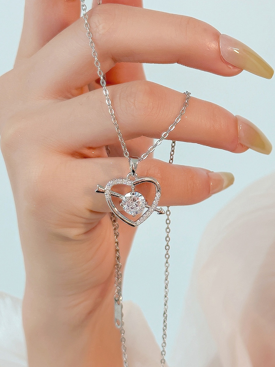 

Jewels Galaxy Silver-Plated Contemporary Pendants with Chains