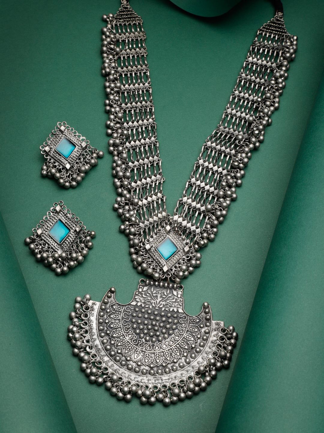 

Moedbuille Silver-Plated Meenakari Stone-Studded Antique Filigree Tribal Jewellery Set