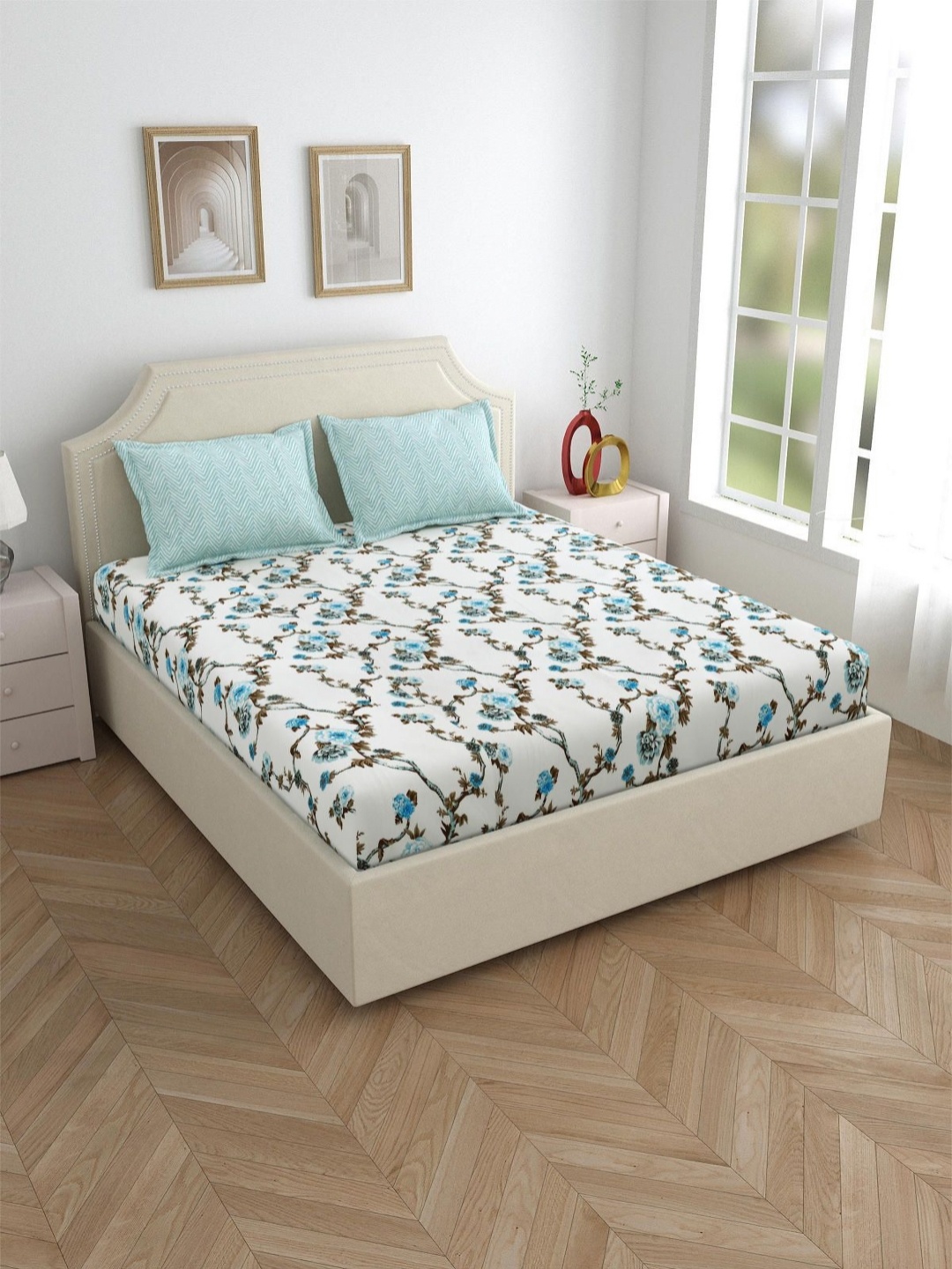 

Myntra Elegant Homes White & Blue Floral 180 TC King Bedsheet with 2 Pillow Covers