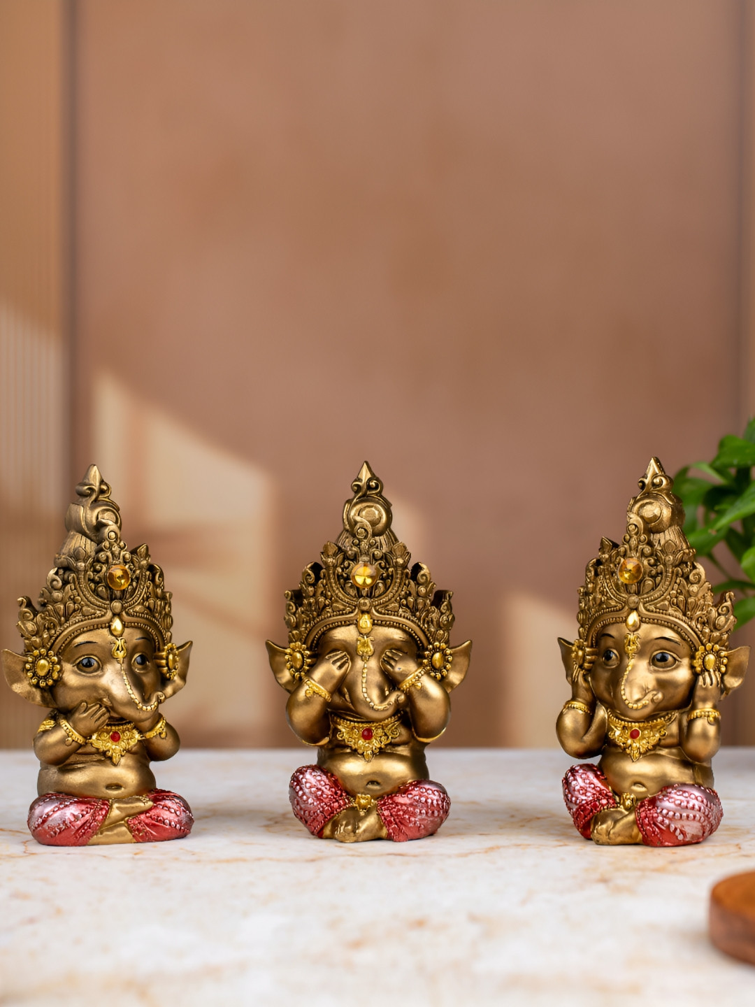 

TYOOHAR Gold-Toned & Red 3 Pieces Ganesha Religious Idol Showpieces