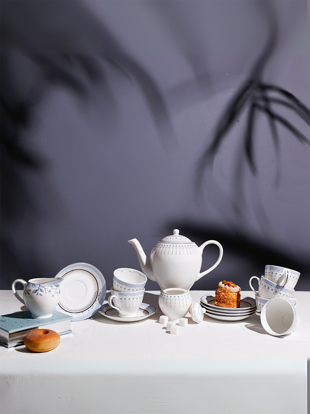 

CLAY CRAFT The Wishing Chair White & Blue 15 Pieces Floral Printed Glossy Ceramic Tea Set