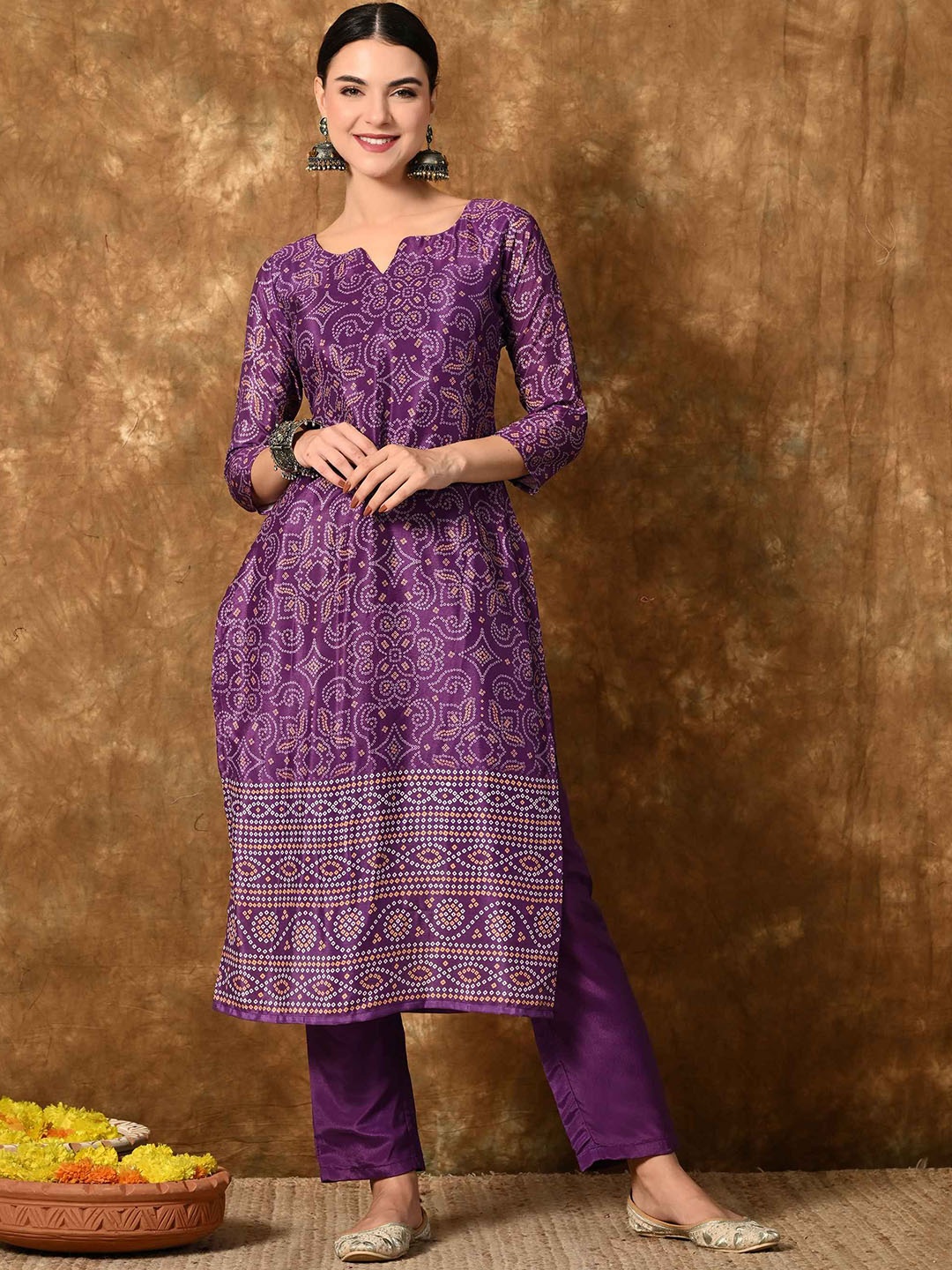 

Krimmple Bandhani Printed Notch Neck Straight Kurta with Trousers & Dupatta, Purple