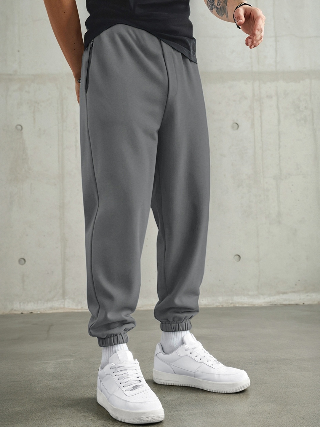 

Bewakoof Men Charcoal Grey Oversized Mid Rise Joggers