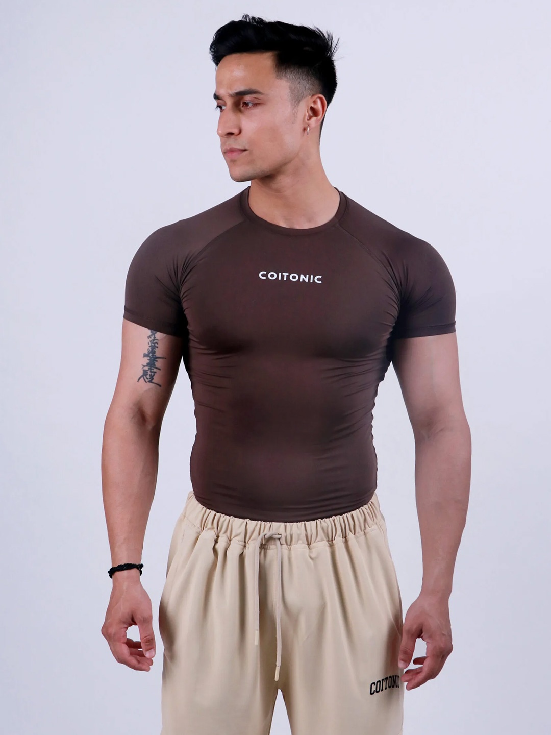 

Coitonic Men Typography Printed Round Neck Compression T-shirt, Brown