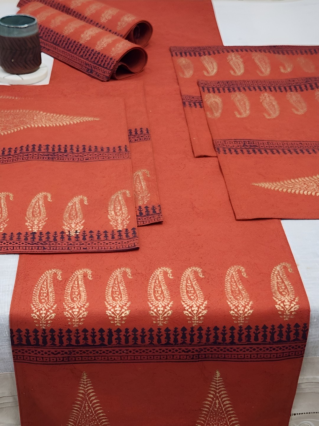 

DESIGN GAATHA Orange & Gold Toned 7 Pcs Ethnic Printed Cotton Table Placemats With Runner