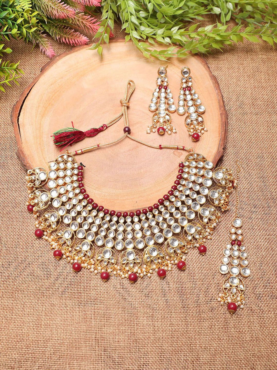 

Ethnicking Gold Plated Kundan Stone Studded & Beaded Necklace and Earrings With Maang Tika