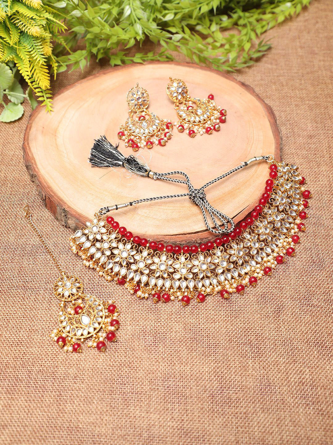

Ethnicking Gold Plated Kundan Stone Studded & Beaded Necklace and Earrings With Maang Tika