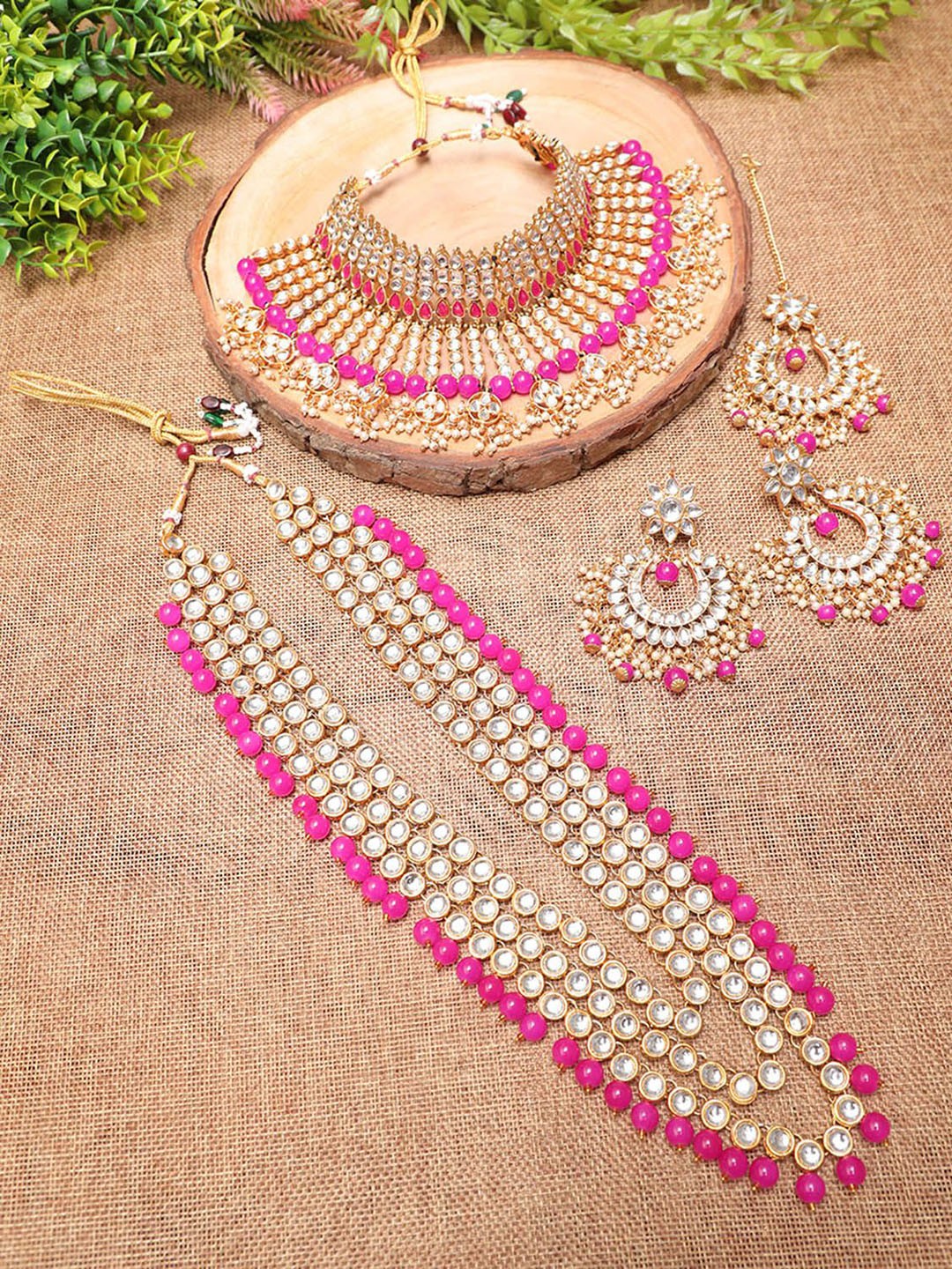 

Ethnicking Gold Plated Kundan Stone Studded & Beaded Necklace and Earrings With Maang Tika