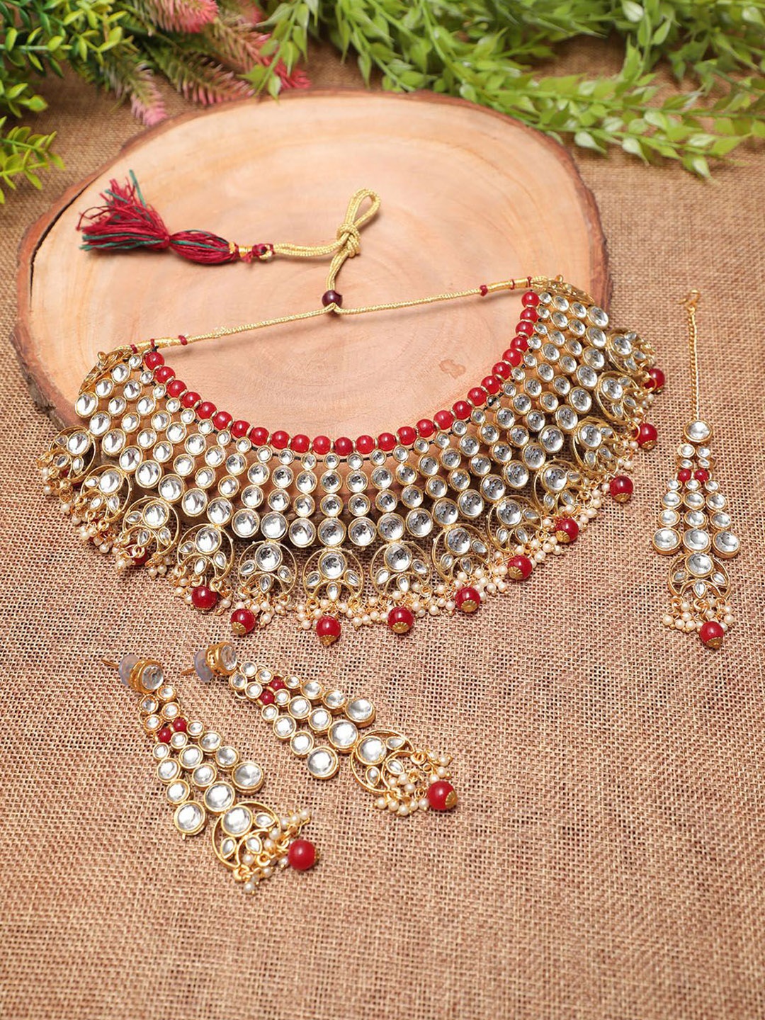 

Ethnicking Gold Plated Kundan Stone Studded & Beaded Necklace and Earrings With Maang Tika