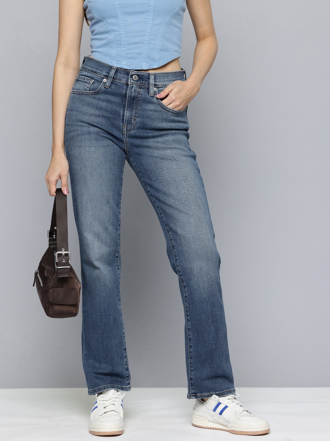 

Levis Women 724 Straight Fit High-Rise Light Fade Stretchable Jeans, Blue