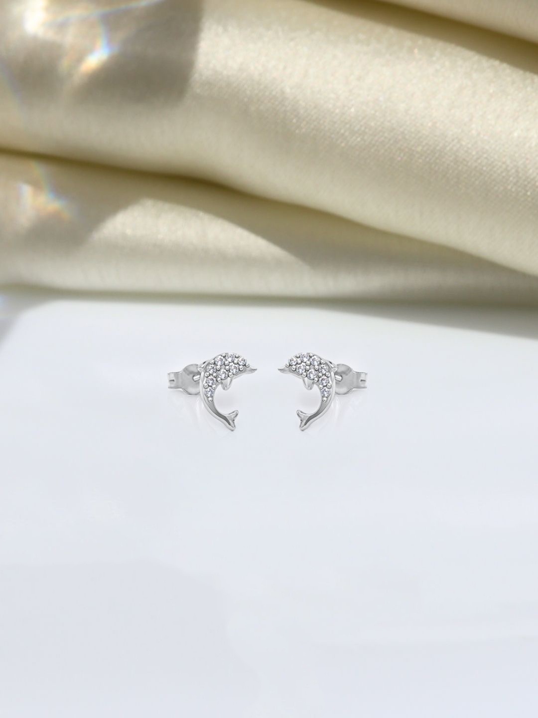 

HighSpark 925 Sterling Silver Zircon Stones Studded Dolphin Shaped Studs