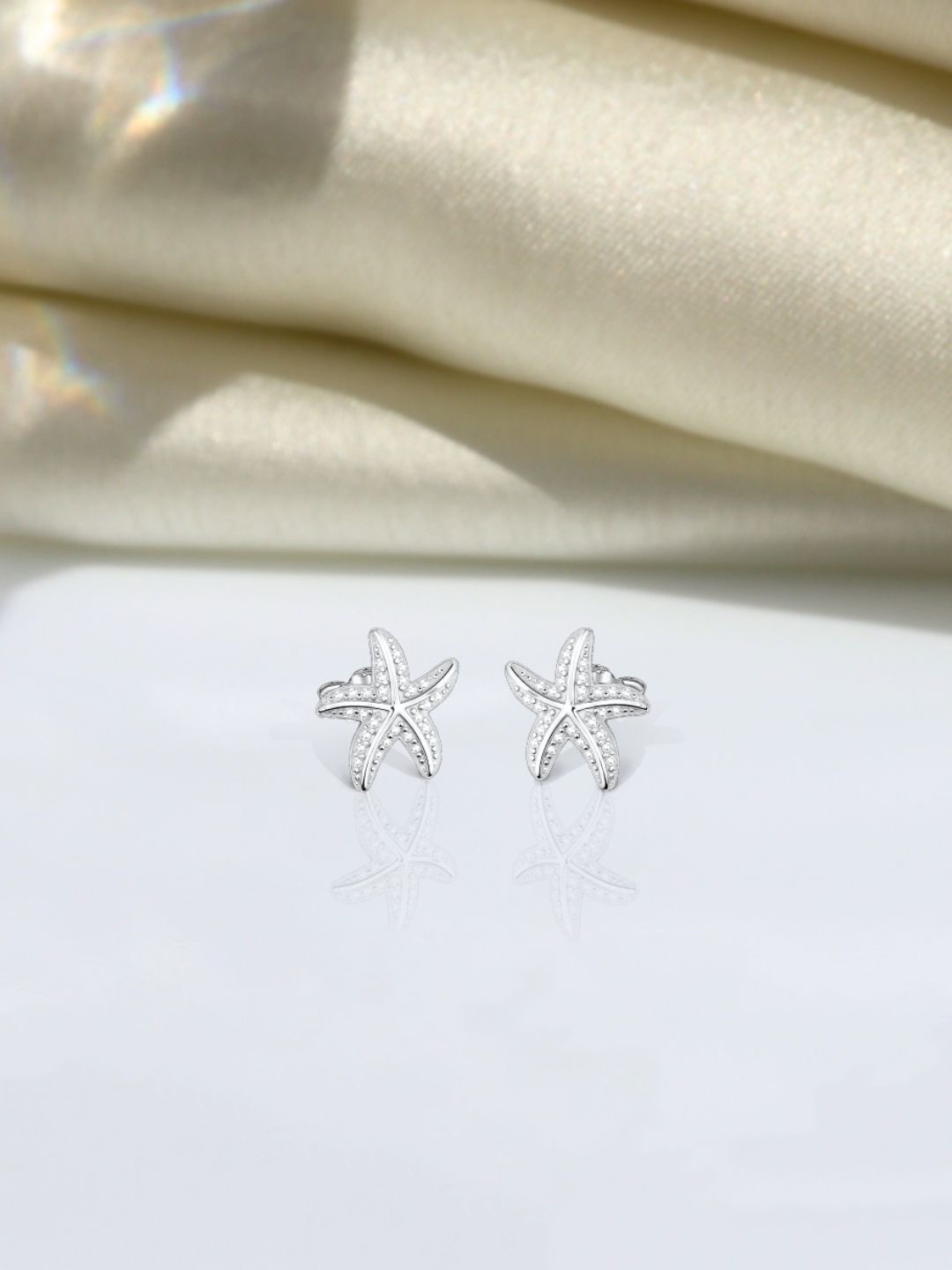 

HighSpark 925 Sterling Silver Zircon Stone Studded Star Shaped Studs