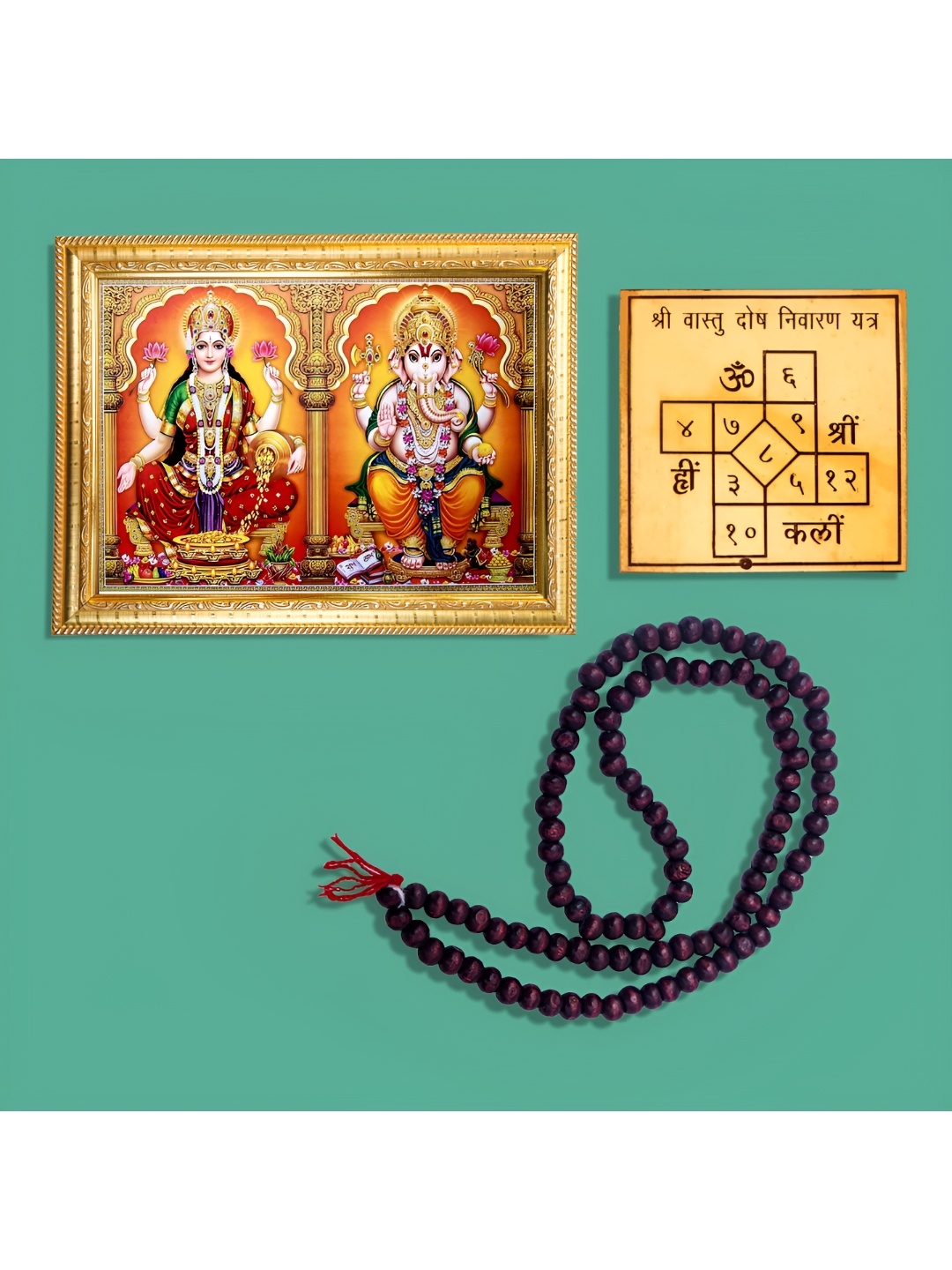 

Hawai Gold Toned Ganesh Lakshmi Photo Frame With 108 Beads Red Chandan Mala & Yantra