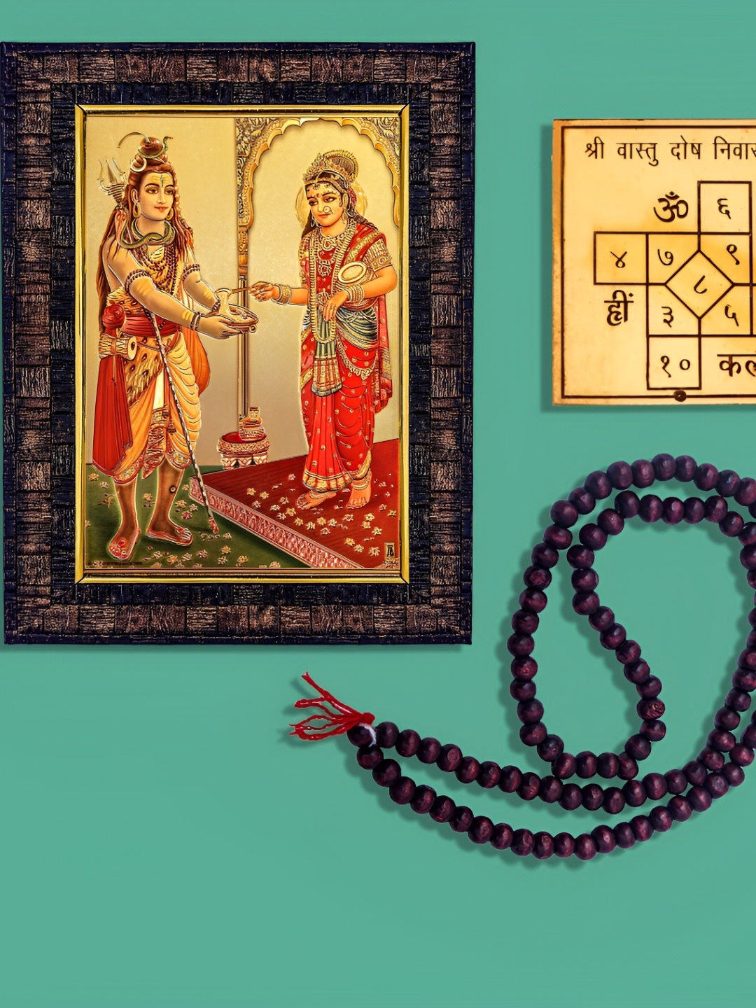 

Hawai Gold Toned Lord Shiva with Annnapurna Devi Wooden Photo Frame With Yantra & Mala