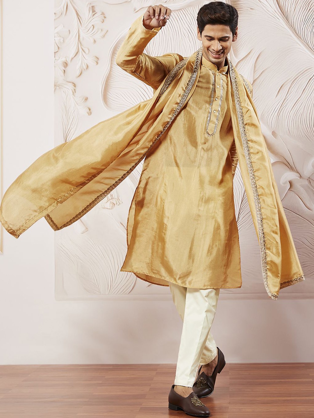 

VASTRAMAY Mandarin Collar Sequinned Tissue Silk Straight Kurta With Trousers & Dupatta, Gold