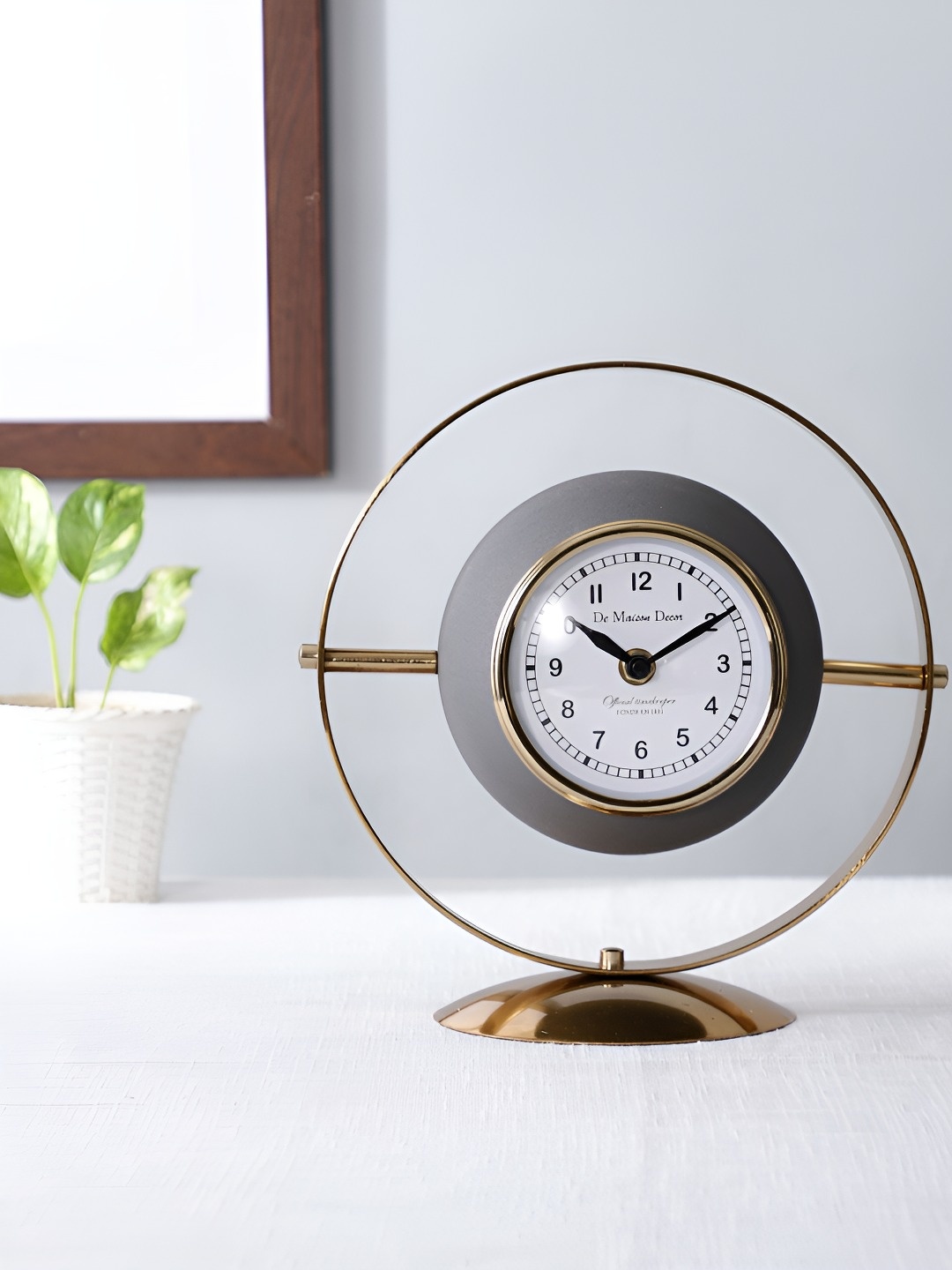 

Decor de Maison Halo Grey & Gold Toned Round Shaped Table Clock