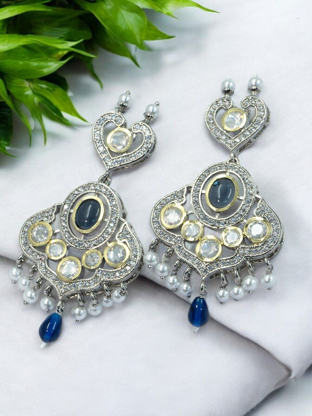 

SHARLEEZ Silver-Plated American Diamonds Studded Contemporary Shaped Drop Earrings