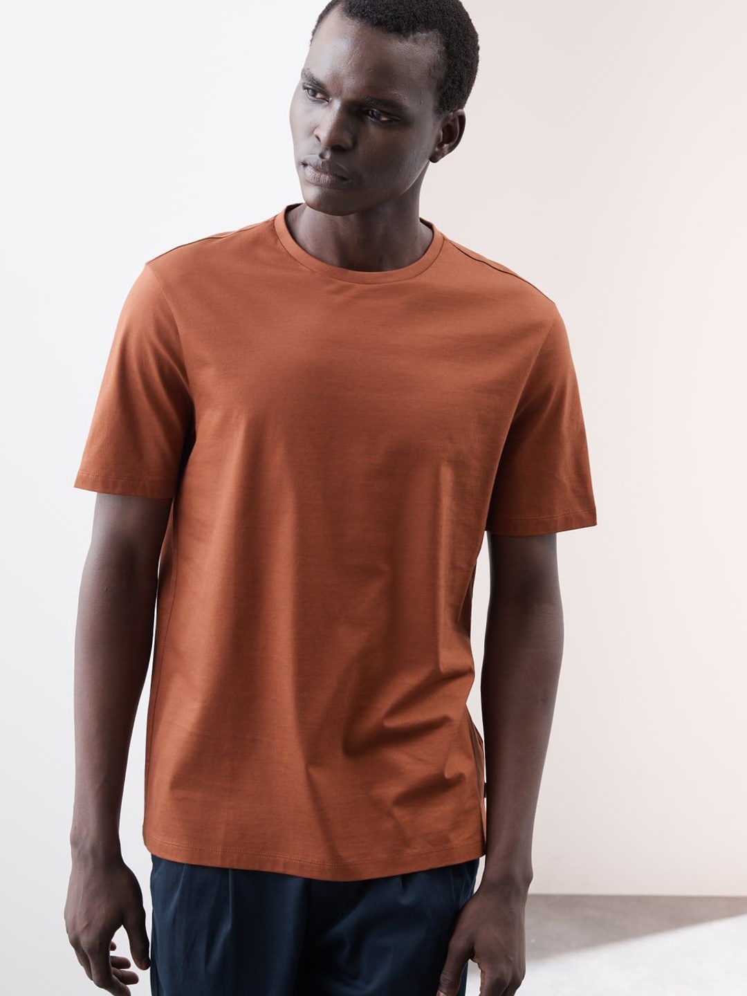 

Marks & Spencer Men Solid Pure Cotton T-shirt, Orange