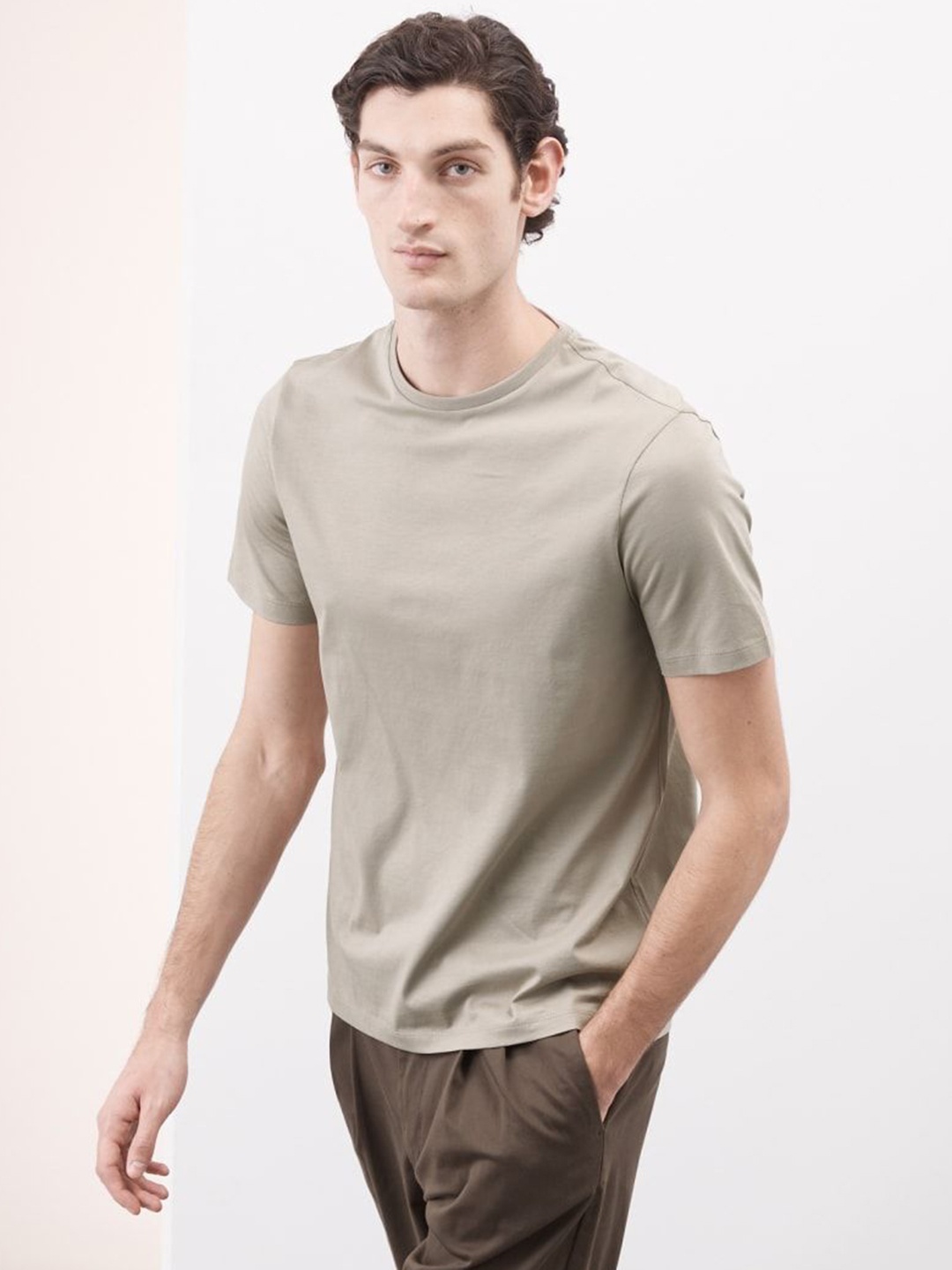 

Marks & Spencer Men Solid Round Neck Cotton T-shirt, Beige