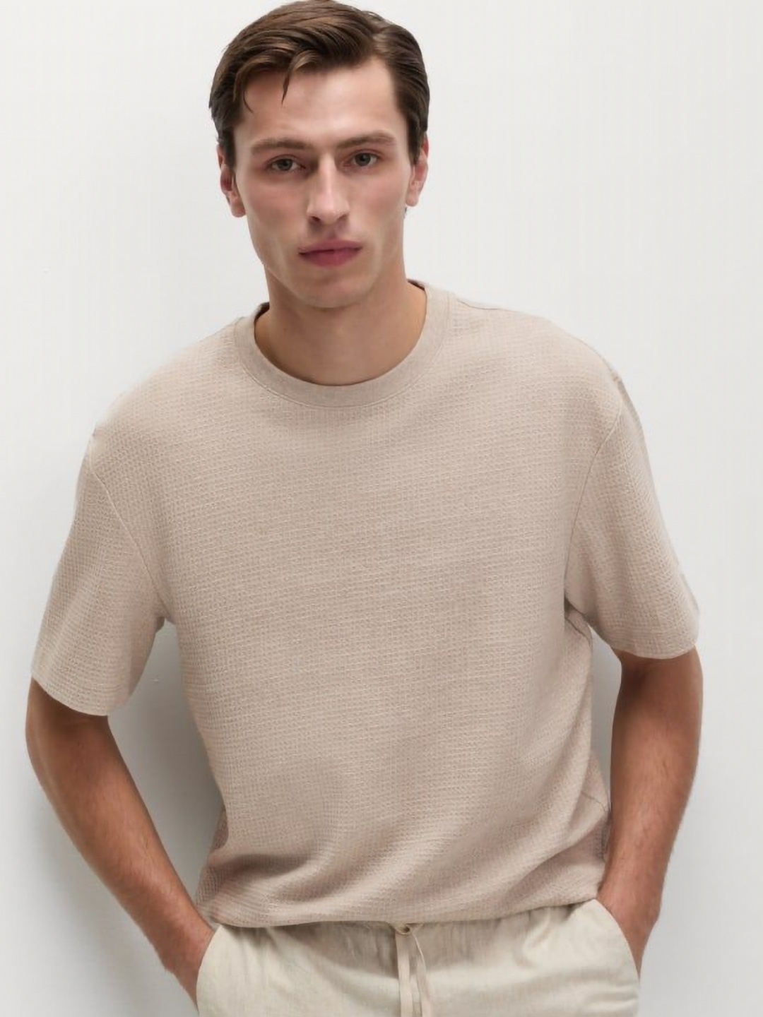 

Marks & Spencer Men Solid Round Neck Cotton T-shirt, Beige