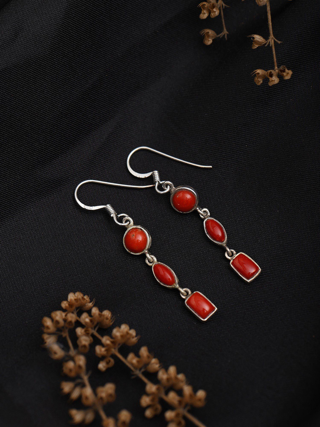 

Exotic India Sterling Silver Dangle Earrings with Coral Gemstone, Red